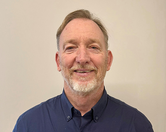 construction site with workers building walls laying foundation in sunny weather